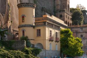 a building on the side of a mountain at Marina Piccola 73 in Sorrento