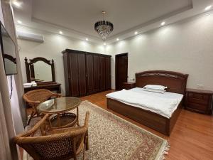 Ένα ή περισσότερα κρεβάτια σε δωμάτιο στο Hello Dushanbe Hostel