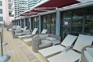 Posezení v ubytování Oceanview Apartment on the beach 123