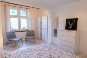 TV a/nebo společenská místnost v ubytování APARTAMENTOS OLGA