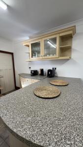 A kitchen or kitchenette at 25 Minutes to Central London Rooms 35