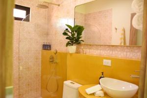 Un baño de Hotel Amavi