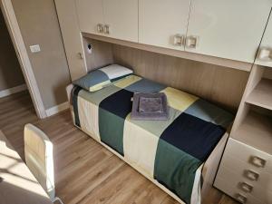 Postel nebo postele na pokoji v ubytování stanzadadanilo