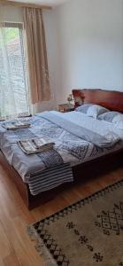Postel nebo postele na pokoji v ubytování Prenoćište Stojadinović