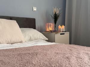 Posteľ alebo postele v izbe v ubytovaní Przytulny apartament 5 minut od morza