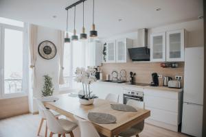 Kuchyň nebo kuchyňský kout v ubytování Splendide appartement Cosy