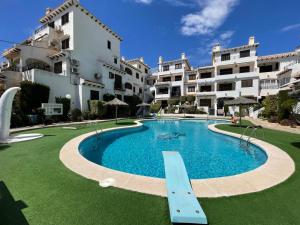 Πισίνα στο ή κοντά στο Lobo en Cabo Apartment, Cabo Roig , Orihuela Costa
