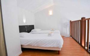 Posteľ alebo postele v izbe v ubytovaní Appartement entier dans résidence de tourisme