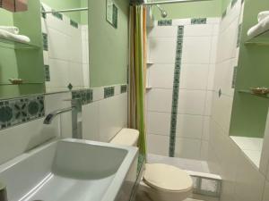 Koupelna v ubytování Hotel Tinkus Inn