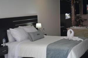 Voodi või voodid majutusasutuse Malokas Resort - Socorro - San Gil toas