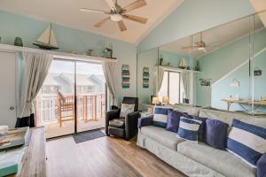 a living room with a couch and a table at Sugar Beach 301 by Vacation Homes Collection in Gulf Shores