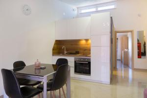Kuchyňa alebo kuchynka v ubytovaní Apartment Masuni