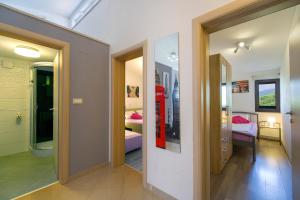 Posteľ alebo postele v izbe v ubytovaní Apartment Masuni