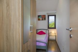 Posteľ alebo postele v izbe v ubytovaní Apartment Masuni