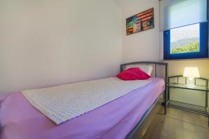 Posteľ alebo postele v izbe v ubytovaní Apartment Masuni