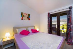 Posteľ alebo postele v izbe v ubytovaní Apartment Masuni
