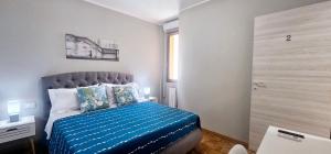 Postel nebo postele na pokoji v ubytování Porta Mazzini Central Rooms