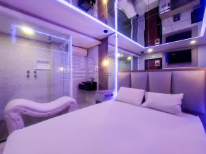 Postel nebo postele na pokoji v ubytování Motel Messalina