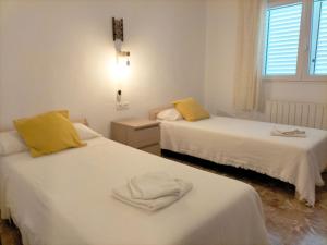 Posteľ alebo postele v izbe v ubytovaní Holiday Home Calas