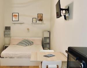 Ένα ή περισσότερα κρεβάτια σε δωμάτιο στο Casa vacanze Il Chicchino