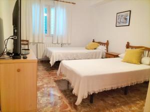 Posteľ alebo postele v izbe v ubytovaní Holiday Home Calas + 25 fotografií