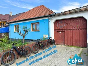a group of bikes parked in front of a house at Blue Home in Avrig