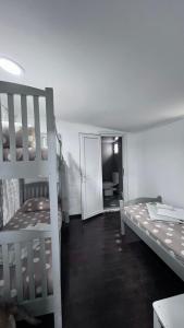Voodi või voodid majutusasutuse Femyli rooms toas