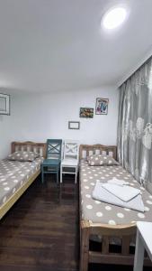 Voodi või voodid majutusasutuse Femyli rooms toas
