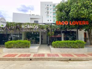 a kico lovers store with a sign in front of it at Apartaestudio Brumilo 2 in Montería