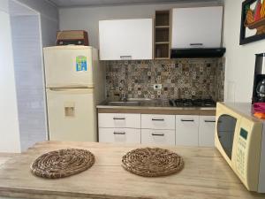 Η κουζίνα ή μικρή κουζίνα στο Apartamento Descanso Central +4 φωτογραφίες