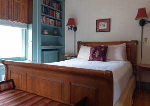 Postel nebo postele na pokoji v ubytování William Henry Miller Inn
