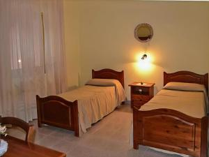 A bed or beds in a room at Villa Fiorita