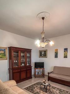 A television and/or entertainment centre at Villa Fiorita