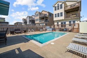 The swimming pool at or close to 5711 - OBX Ta SEA by Resort Realty