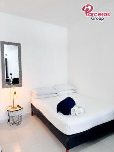 מיטה או מיטות בחדר ב-Apartamentos Amoblados En La Circunvalar Sector La Rebeca