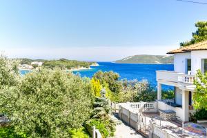 a view of the ocean from a house at Apartments by the sea Supetarska Draga - Donja, Rab - 2013 in Rab