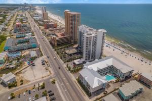 an overhead view of a city with a beach and buildings at Sea Glass 316 by Vacation Homes Collection in Gulf Shores