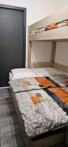 Postel nebo postele na pokoji v ubytování Appartement neuf classé pour 4