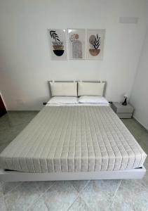 Ένα ή περισσότερα κρεβάτια σε δωμάτιο στο LIKE HOME