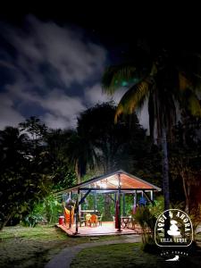 a gazebo with a table and chairs in it at Aqui Ahora at Villa Verde in San Andrés