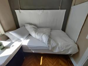 Postel nebo postele na pokoji v ubytování B&B House of Straw Amsterdam