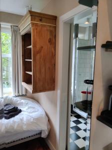 Postel nebo postele na pokoji v ubytování B&B House of Straw Amsterdam