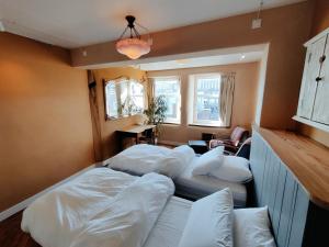 Postel nebo postele na pokoji v ubytování B&B House of Straw Amsterdam