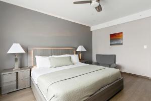 Postel nebo postele na pokoji v ubytování Hotel Sheldon