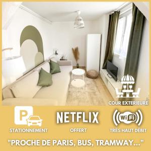 a white living room with a bed and a tv at Le Kaki Bohème - Studio proche Université de Paris 13 in Villetaneuse