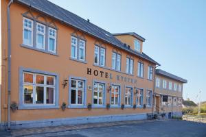 a hotel kristian in the middle of a street at Hotel Kysten in Hasle