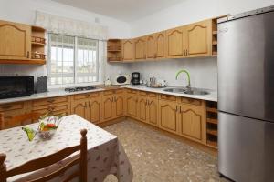 Kuchyňa alebo kuchynka v ubytovaní Apartamentos "Un Rico Domingo", Parking solo planta baja