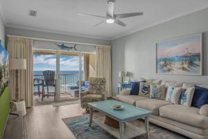 a living room with a couch and a table at Marlin Key 4C by Vacation Homes Collection in Orange Beach