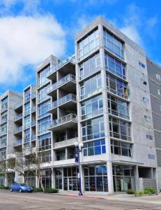 an apartment building with a lot of windows at Petco, City, Ocean Views! Gaslamp at it's finest! in San Diego