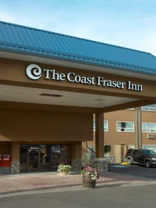 a sign on the front of a coast transfer inn at Coast Fraser Inn in Williams Lake